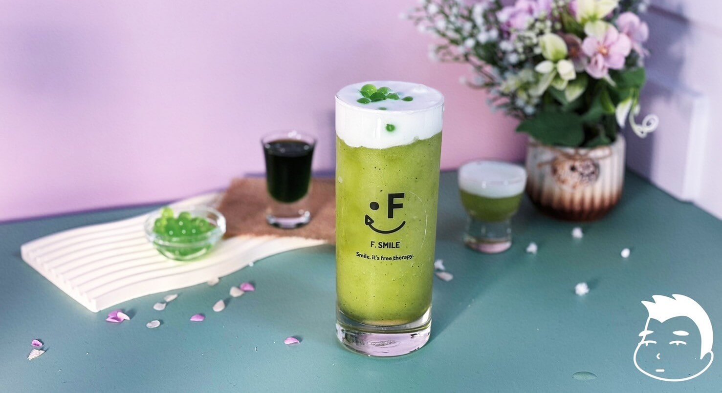 Kiwi Pop smoothie with kiwi syrup, jasmine green tea, kiwi popping boba, and cheese milk foam